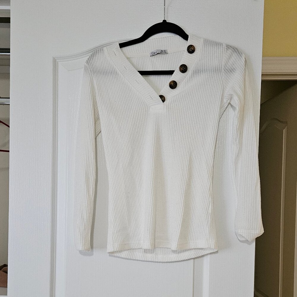 white long sleeve top